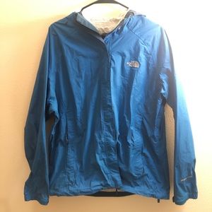 Blue raincoat by North face